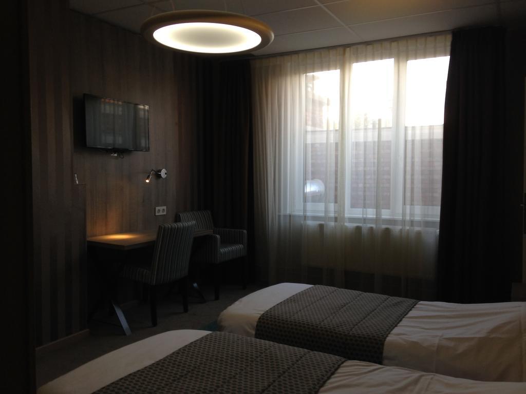 Hotel Mille Colonnes Lovaina Quarto foto